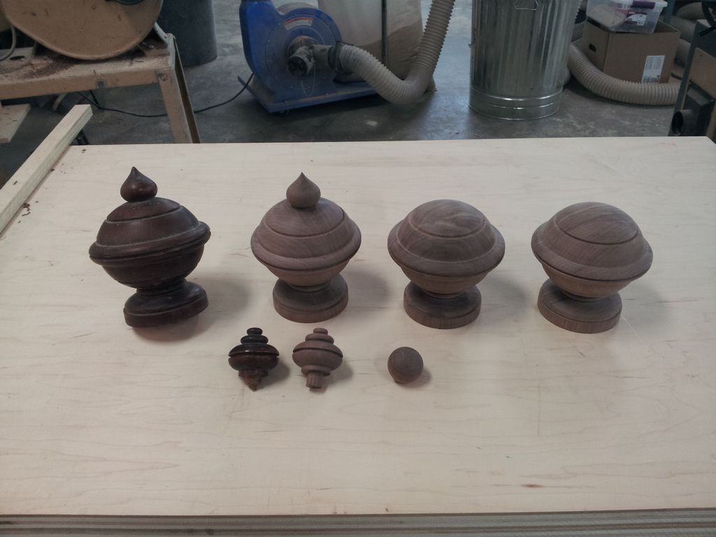Walnut finials replicated to match existing ornate forms, antique bed parts